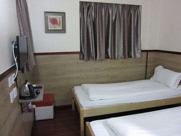 Imagen de la habitación del Motel Hong Kong, Hong Kong. Foto 7