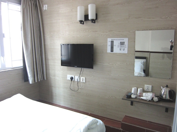 Imagen de la habitación del Motel Hong Kong, Hong Kong. Foto 15