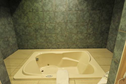 Imagen de la habitación del Motel Hotel Bonsoir. Foto 5