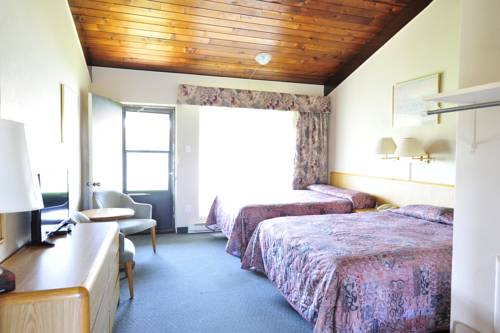 Imagen de la habitación del Motel Hotel Bonsoir. Foto 10