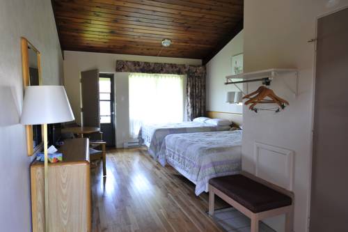 Imagen de la habitación del Motel Hotel Bonsoir. Foto 11