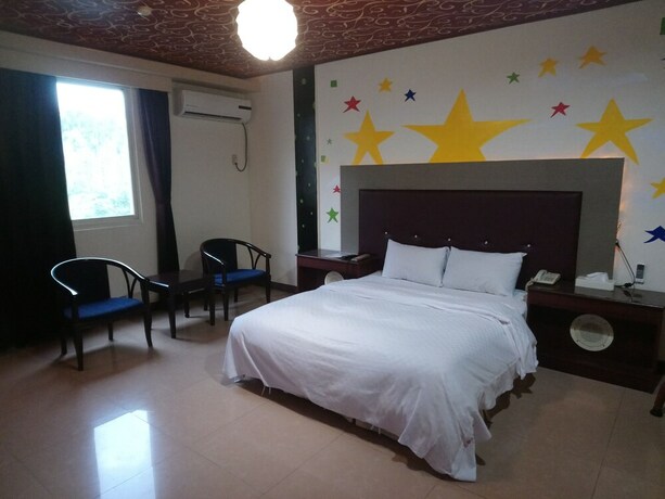 Imagen de la habitación del Motel Hua Du, Jiji. Foto 3