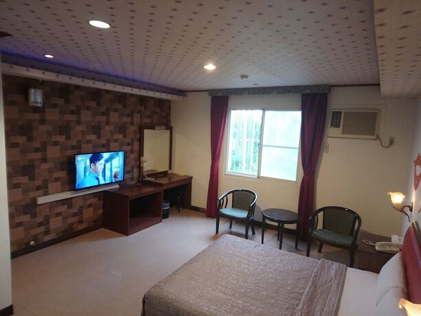Imagen de la habitación del Motel Hua Du, Jiji. Foto 4