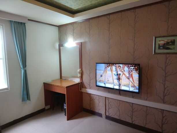 Imagen de la habitación del Motel Hua Du, Jiji. Foto 10