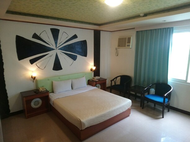 Imagen de la habitación del Motel Hua Du, Jiji. Foto 11