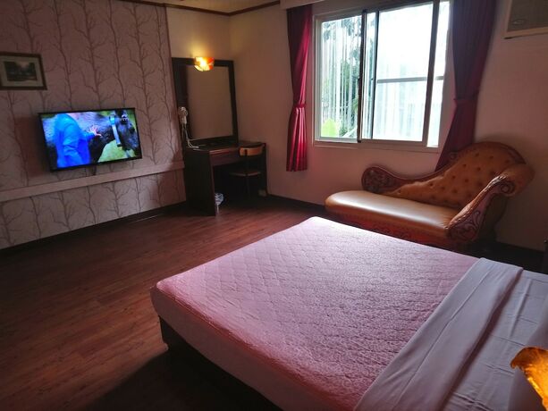 Imagen de la habitación del Motel Hua Du, Jiji. Foto 14