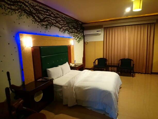 Imagen de la habitación del Motel Hua Du, Jiji. Foto 15