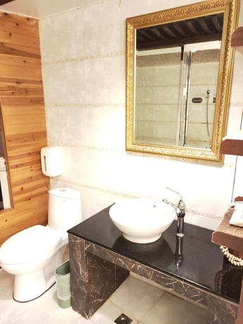Imagen de la habitación del Motel Ido Dazhi. Foto 19