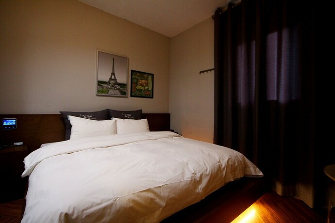 Imagen de la habitación del Motel Iksan Roman Drive-in Hotel. Foto 17