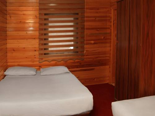 Imagen de la habitación del Motel Inanlar Deluxe Hotel and Bungalow. Foto 4