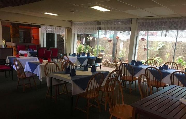 Imagen del bar/restaurante del Motel Inland Oasis. Foto 4