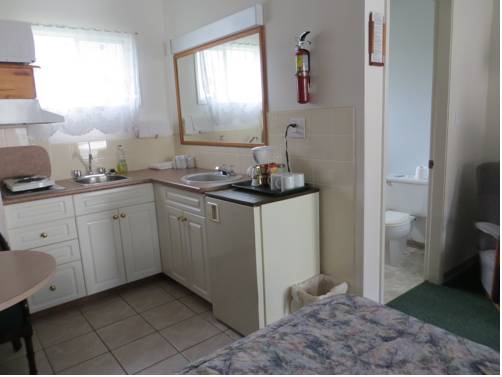 Imagen de la habitación del Motel Inntowne. Foto 13