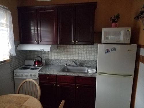 Imagen de la habitación del Motel Ivory Sands Beach Suites. Foto 4