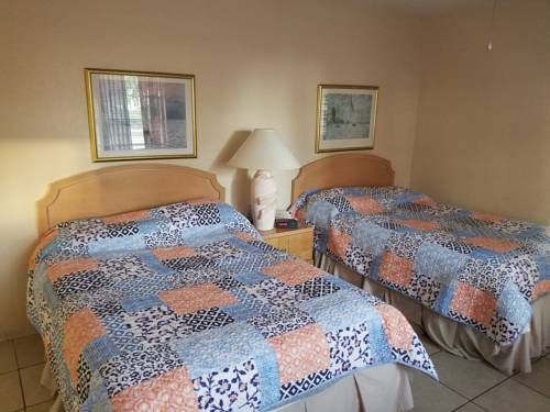 Imagen de la habitación del Motel Ivory Sands Beach Suites. Foto 8