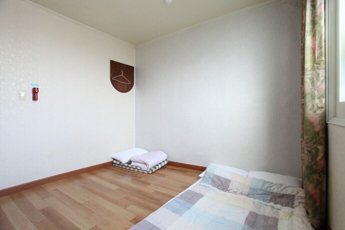 Imagen de la habitación del Motel Jeju Samoa. Foto 19