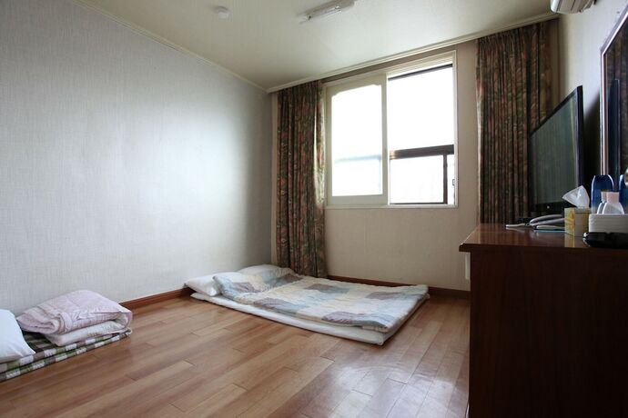 Imagen de la habitación del Motel Jeju Samoa. Foto 36