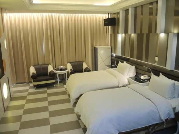 Imagen de la habitación del Motel Kai-hong. Foto 32
