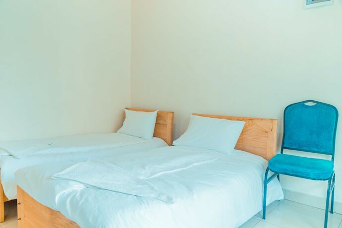 Imagen de la habitación del Motel La Corniche Nyabihu. Foto 5