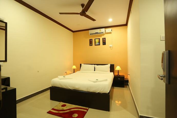 Imagen de la habitación del Motel La Grandeur. Foto 18