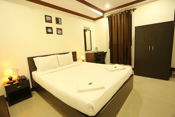 Imagen de la habitación del Motel La Grandeur. Foto 19