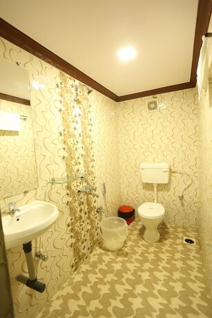 Imagen de la habitación del Motel La Grandeur. Foto 23