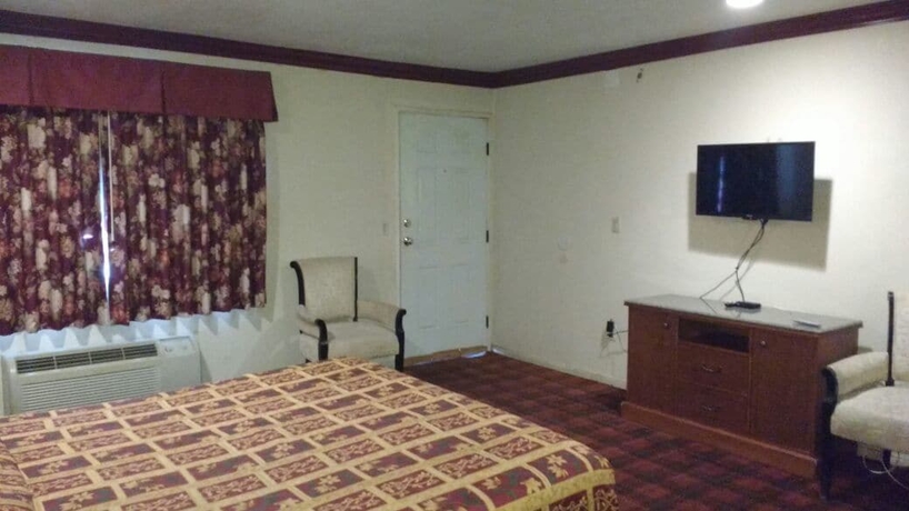 Imagen de la habitación del Motel La Petite Rouge. Foto 12