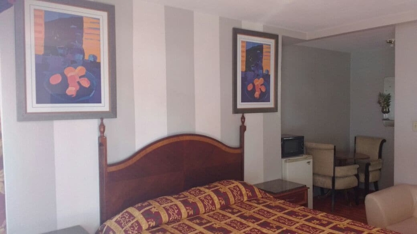 Imagen de la habitación del Motel La Petite Rouge. Foto 14