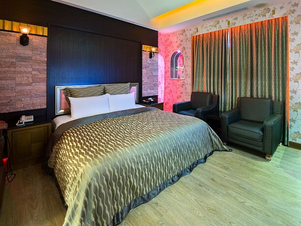 Imagen de la habitación del Motel Lai Yin. Foto 17