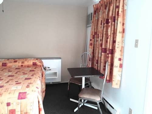 Imagen de la habitación del Motel L'avantage. Foto 11