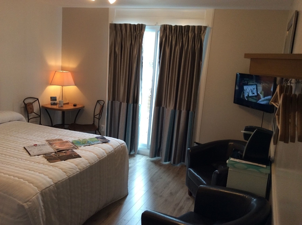 Imagen de la habitación del Motel Le Beluga. Foto 10