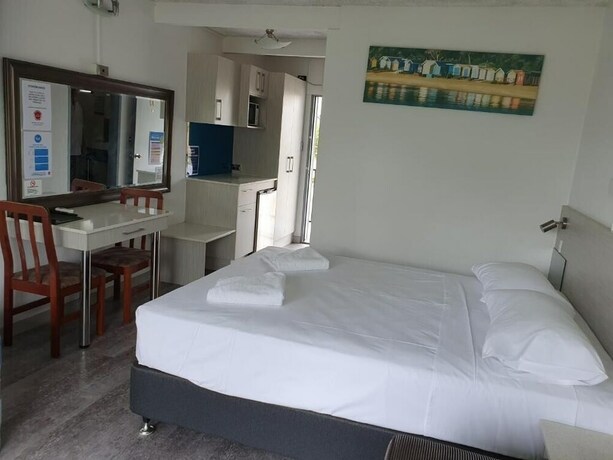 Imagen de la habitación del Motel Le George. Foto 16