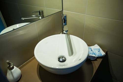 Imagen de la habitación del Motel Le Léman, Commugny. Foto 5