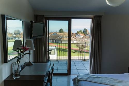 Imagen de la habitación del Motel Le Léman, Commugny. Foto 7