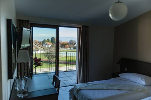 Imagen de la habitación del Motel Le Léman, Commugny. Foto 8