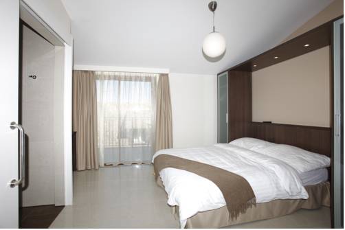 Imagen de la habitación del Motel Le Léman, Commugny. Foto 11