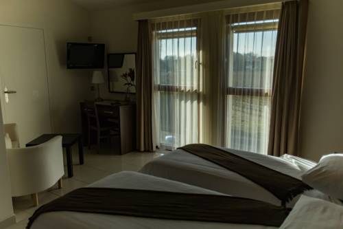 Imagen de la habitación del Motel Le Léman, Commugny. Foto 15