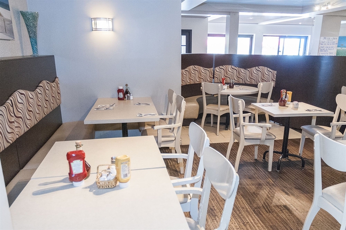 Imagen del bar/restaurante del Motel Le Marquis. Foto 2