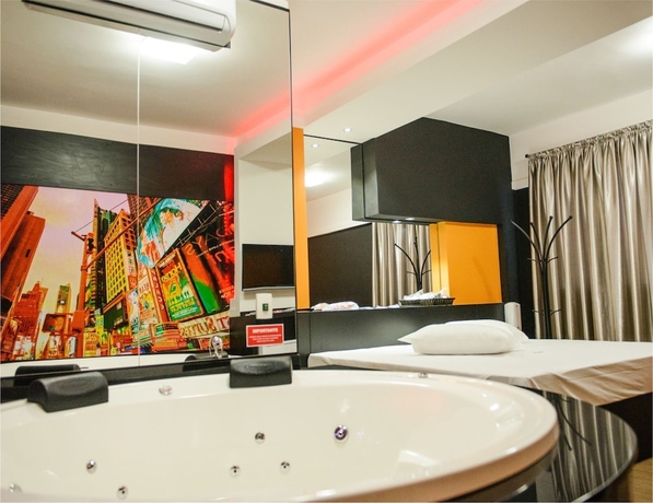 Imagen de la habitación del Motel Le Parc. Foto 11