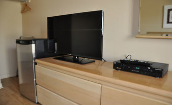 Imagen de la habitación del Motel Les Pignons Verts. Foto 6