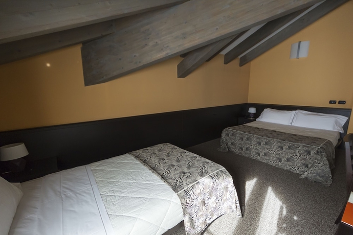 Imagen de la habitación del Motel Malpensa Inn. Foto 15