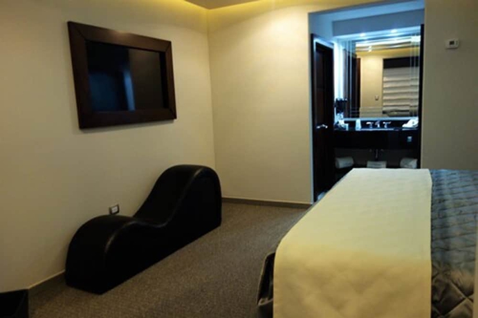 Imagen de la habitación del Motel Marche. Foto 4