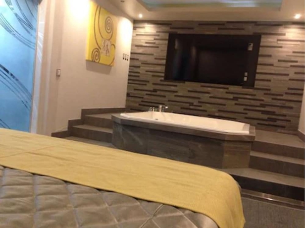 Imagen de la habitación del Motel Marche. Foto 10