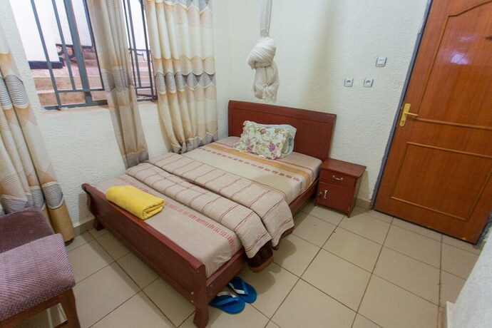 Imagen de la habitación del Motel Medi, Kigali. Foto 17