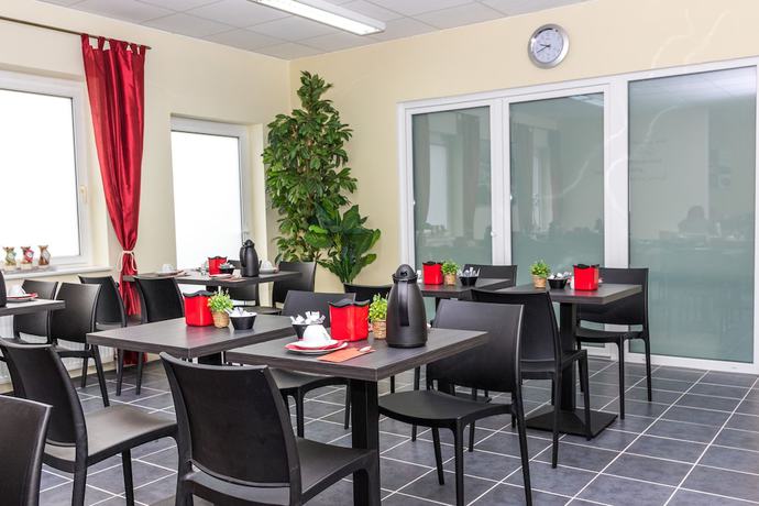 Imagen del bar/restaurante del Motel Messe Laatzen. Foto 4