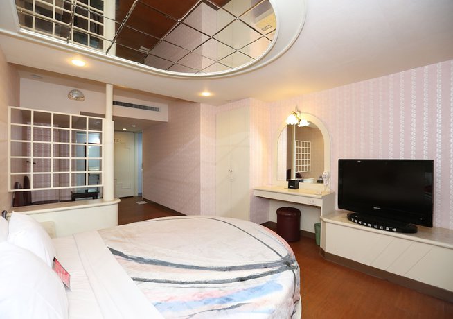 Imagen de la habitación del Motel Midi Tainan Branch. Foto 3