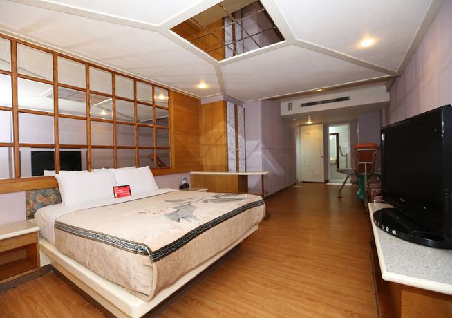 Imagen de la habitación del Motel Midi Tainan Branch. Foto 4