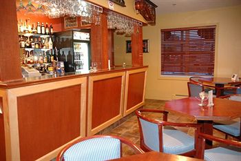 Imagen del bar/restaurante del Motel Midtown And Suites, Moncton. Foto 3