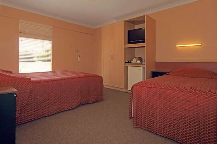 Imagen de la habitación del Motel Milton Village. Foto 18