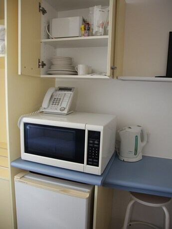 Imagen de la habitación del Motel Moody's. Foto 28