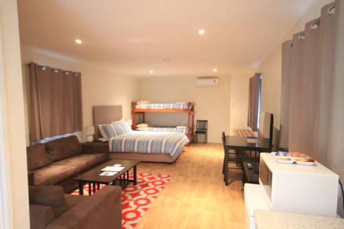 Imagen de la habitación del Motel Mossman Resort Holiday Villas. Foto 4